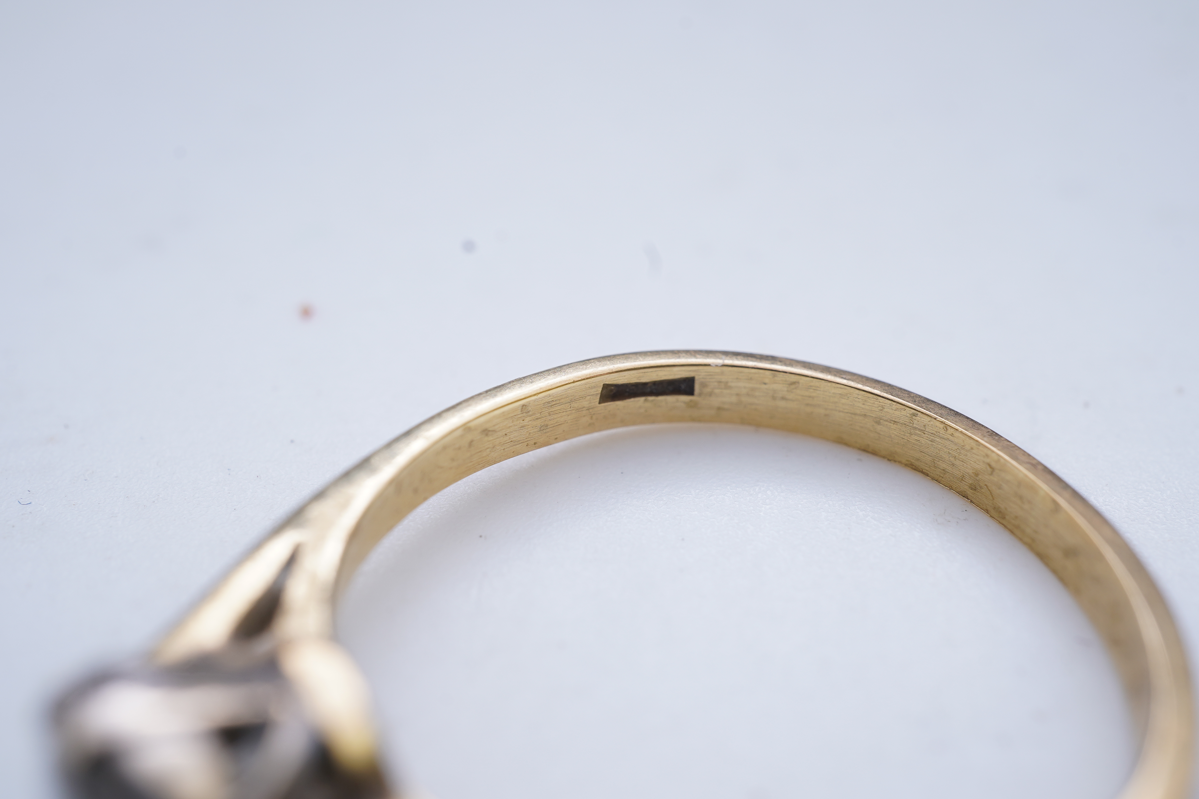 A diamond solitaire ring